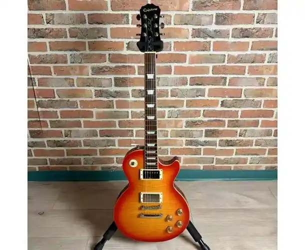 Affaire À Saisir LES PAUL TRIBUTE PLUS 1960 HERITAGE CHERRY SUNBURST + ETUI